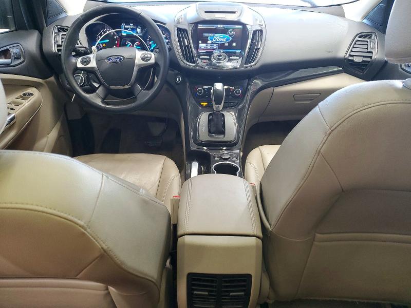 Photo 8 from auction – 2015 FORD ESCAPE with VIN 1FMCU9J9XFUC82387