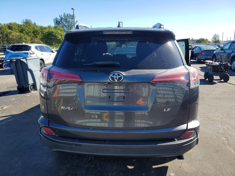 Photo 6 from auction – 2018 TOYOTA RAV4 with VIN 2T3ZFREV1JW449053