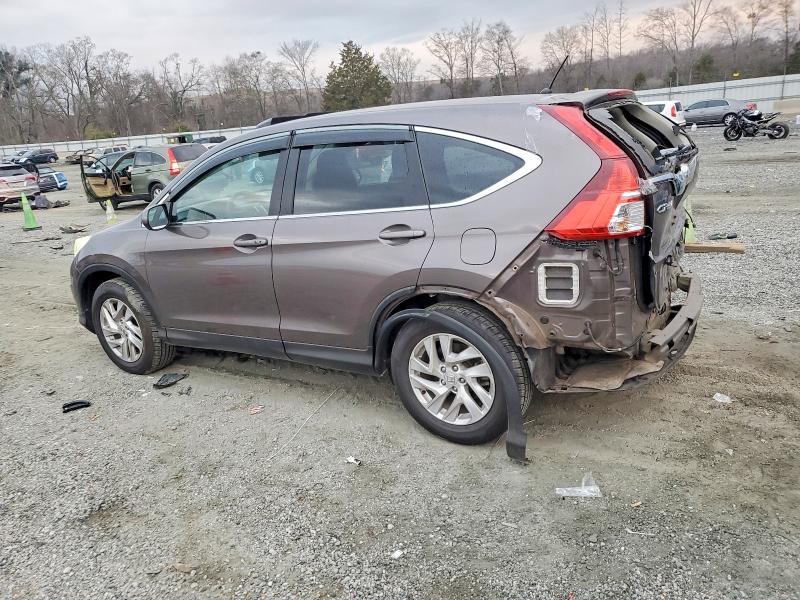 Photo 2 from auction – 2016 HONDA CR-V with VIN 2HKRM3H55GH522987