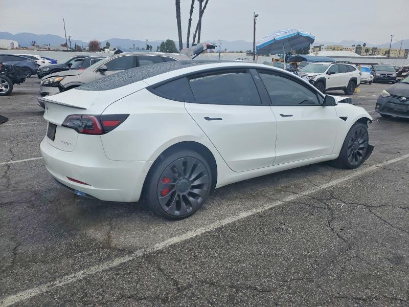 Photo 3 from auction – 2021 TESLA MODEL 3 with VIN 5YJ3E1EC4MF935939