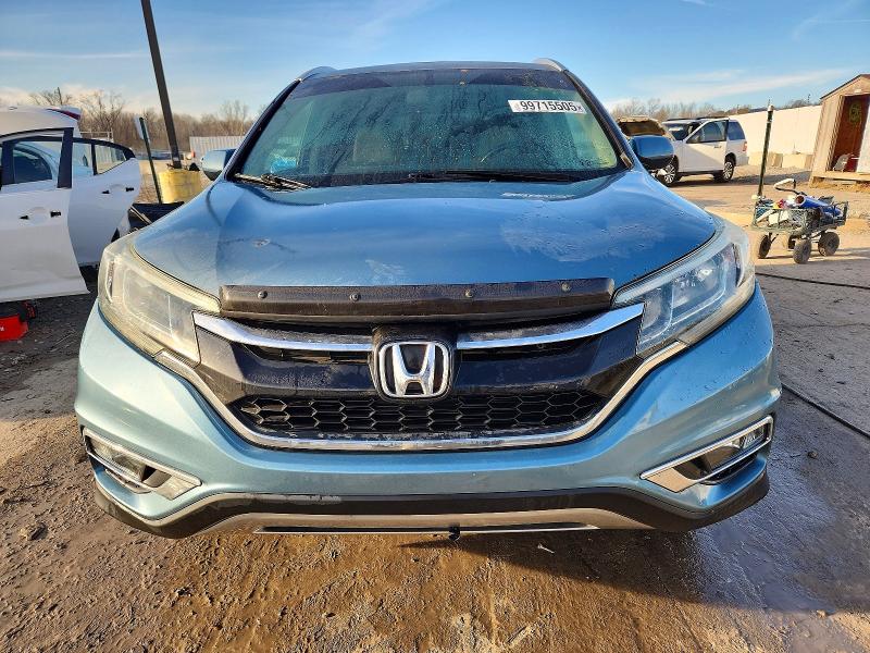 Photo 5 from auction – 2015 HONDA CR-V EXL with VIN 2HKRM4H74FH636176