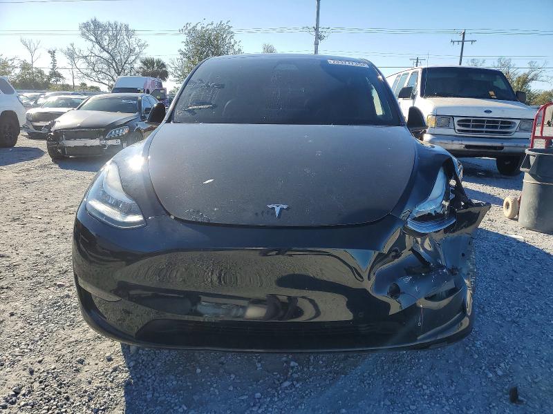 Photo 5 from auction – 2022 TESLA MODEL Y with VIN 7SAYGAEE7NF430225