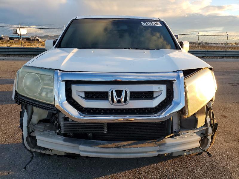 Photo 5 from auction – 2009 HONDA PILOT EXL with VIN 5FNYF48619B033928