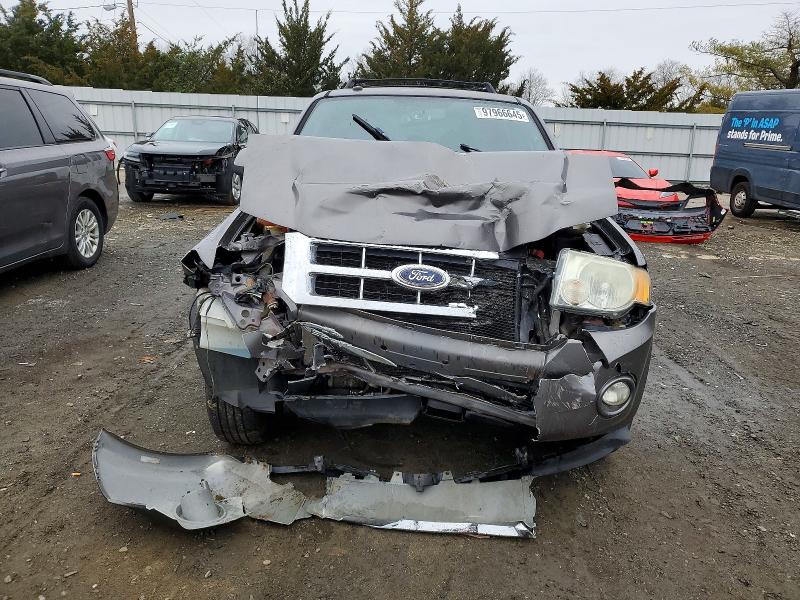 Photo 5 from auction – 2010 FORD ESCAPE LIM with VIN 1FMCU9EG3AKB20923
