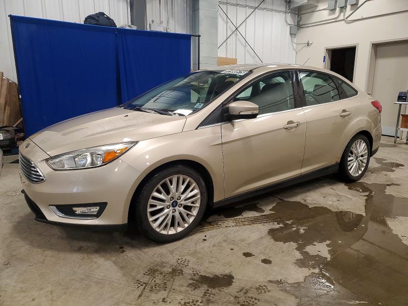 FORD FOCUS TITA 2017 with VIN 1FADP3J24HL310442 - Photo from auction