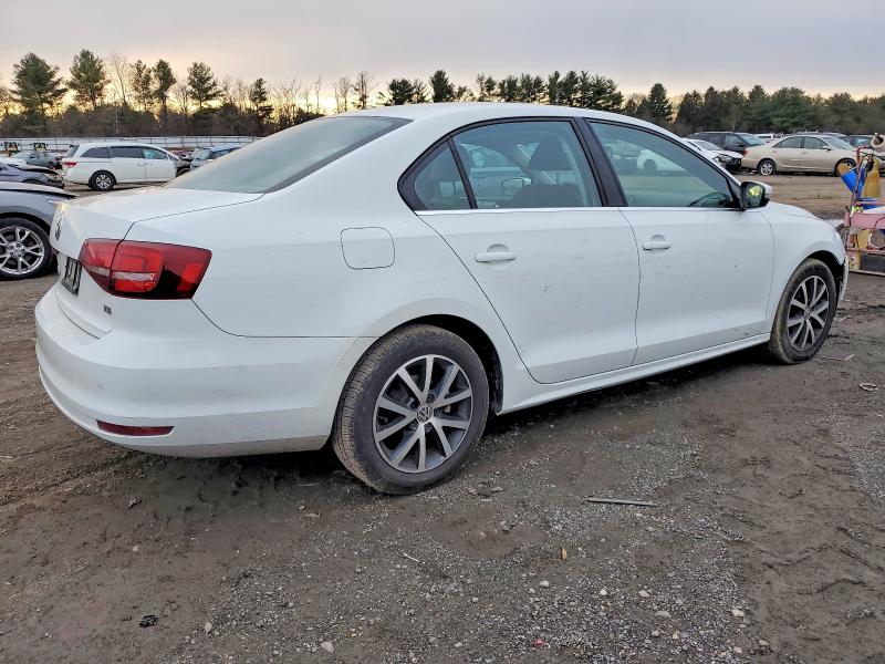 Photo 3 from auction – 2017 VOLKSWAGEN JETTA with VIN 3VWDB7AJ4HM376556