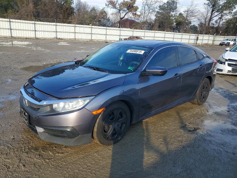 HONDA CIVIC LX 2018 with VIN 2HGFC2F55JH541950 - Photo from auction