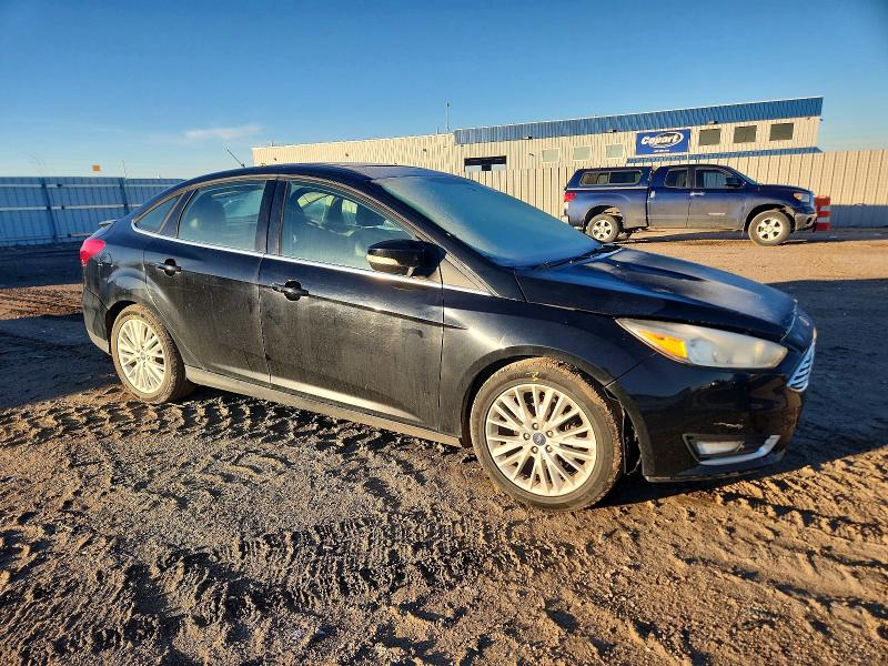 Photo 4 from auction – 2018 FORD FOCUS TITA with VIN 1FADP3J20JL288302