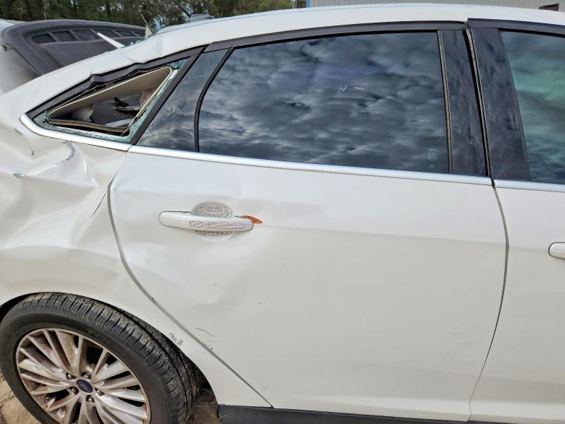 Photo 10 from auction – 2016 FORD FOCUS with VIN 1FADP3J21GL266415