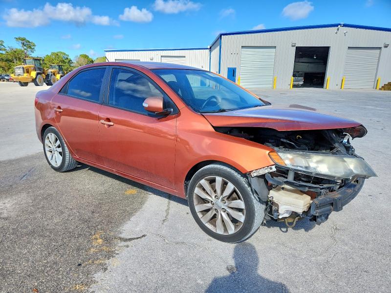 Photo 4 from auction – 2010 KIA FORTE with VIN KNAFW4A36A5304461