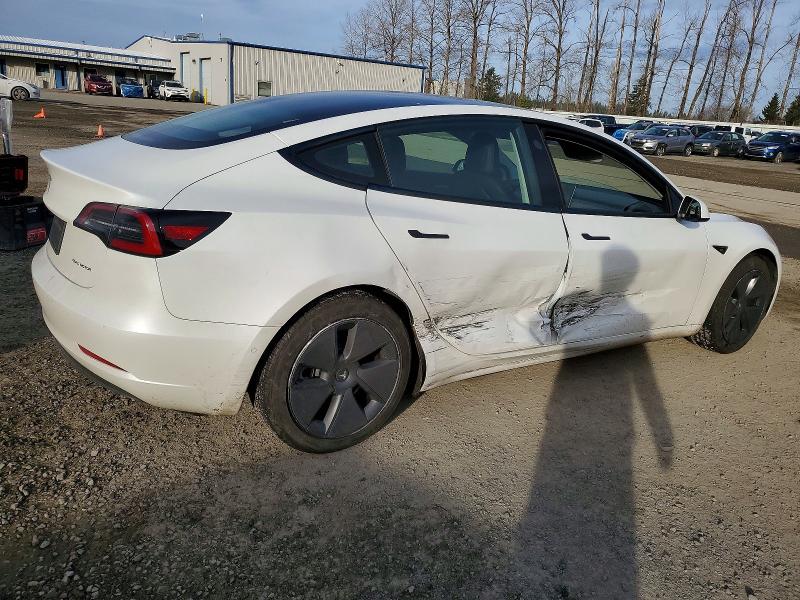Photo 3 from auction – 2022 TESLA MODEL 3 with VIN 5YJ3E1EB8NF210241
