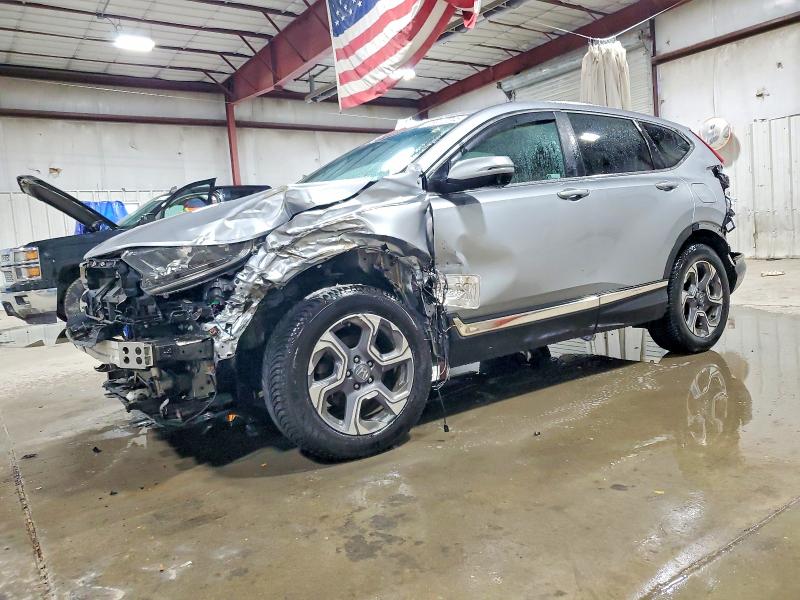 HONDA CR-V EX 2018 with VIN 7FARW2H50JE101404 - Photo from auction