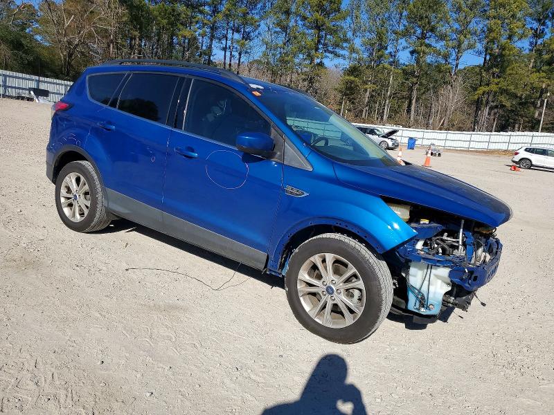 Photo 4 from auction – 2018 FORD ESCAPE with VIN 1FMCU0HD0JUA16116