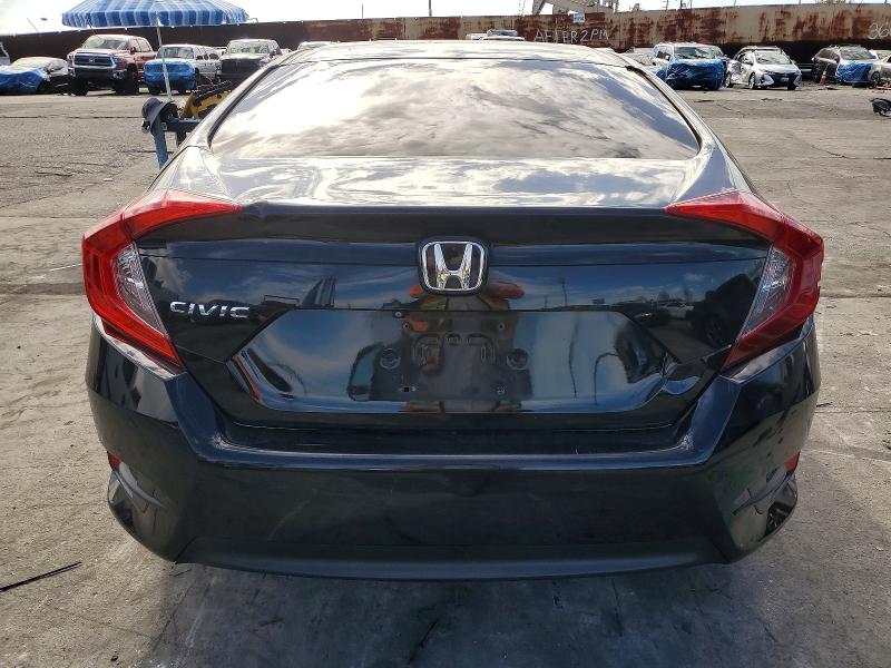 Photo 6 from auction – 2017 HONDA CIVIC LX with VIN 2HGFC2F51HH558027