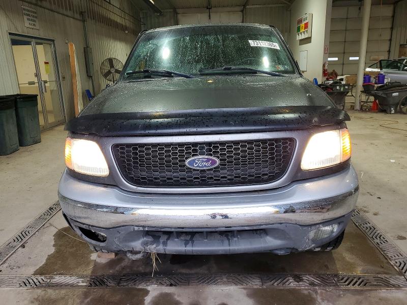 Photo 5 from auction – 2002 FORD F150 with VIN 1FTRX18L72NA95749