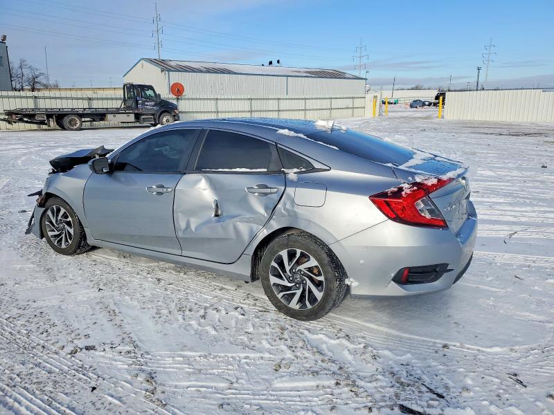 Photo 2 from auction – 2018 HONDA CIVIC EX with VIN 2HGFC2F74JH563486