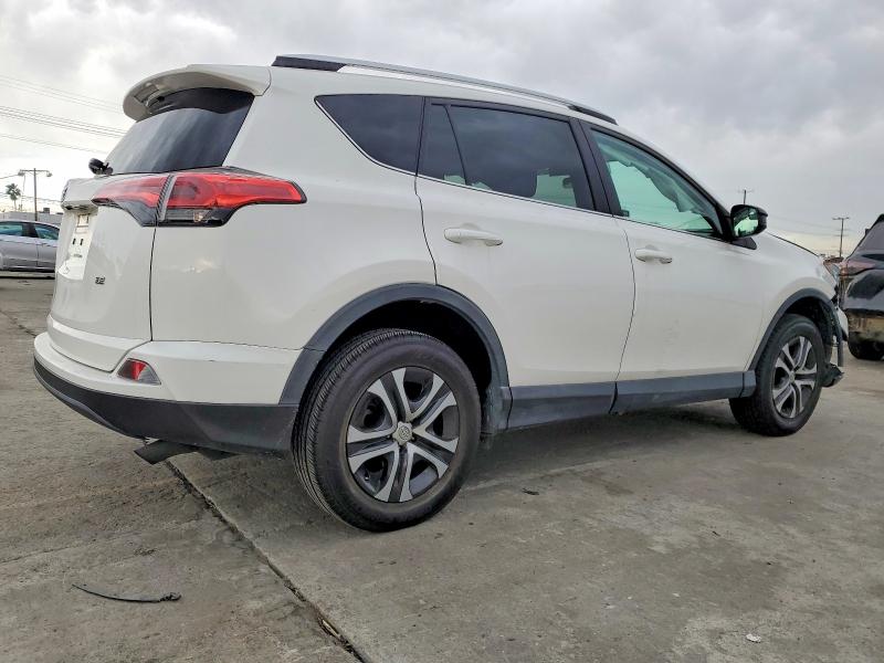 Photo 3 from auction – 2016 TOYOTA RAV4 with VIN 2T3ZFREV0GW293113