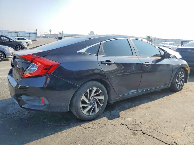 Photo 3 from auction – 2016 HONDA CIVIC with VIN 2HGFC2F77GH511682