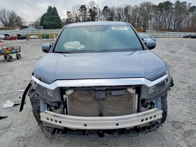 Photo 5 from auction – 2023 HONDA PASSPORT E with VIN 5FNYF8H52PB031147