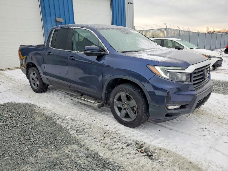 Photo 4 from auction – 2021 HONDA RIDGELINE with VIN 5FPYK3F76MB500620