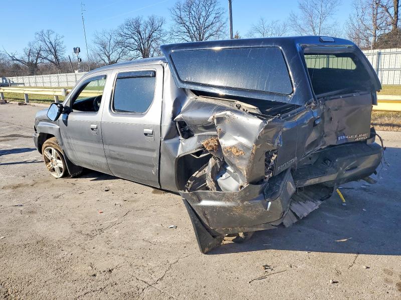 Photo 2 from auction – 2013 HONDA RIDGELINE with VIN 5FPYK1F50DB015781