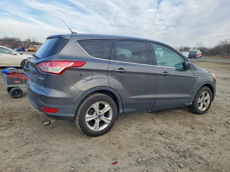Photo 3 from auction – 2015 FORD ESCAPE with VIN 1FMCU0GX6FUC40624