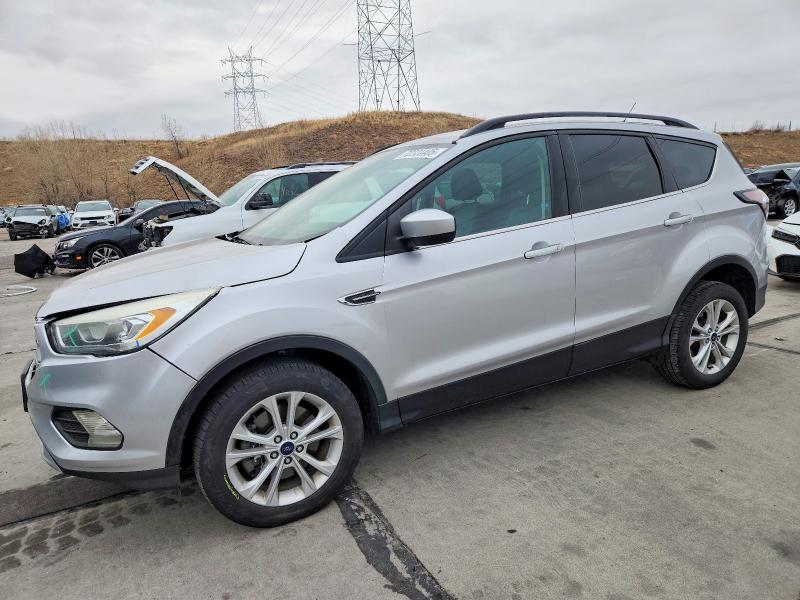FORD ESCAPE 2017 with VIN 1FMCU9GD5HUA40024 - Photo from auction