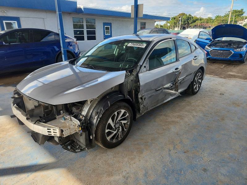HONDA CIVIC EX 2017 with VIN 19XFC2F84HE218388 - Photo from auction