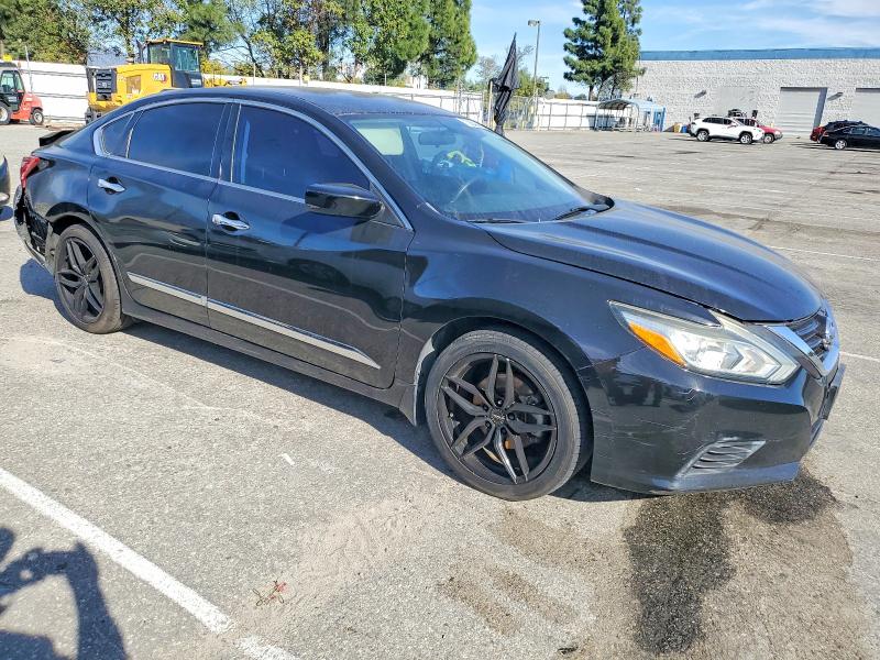 Photo 4 from auction – 2016 NISS ALTIMA with VIN 1N4AL3AP6GC147687