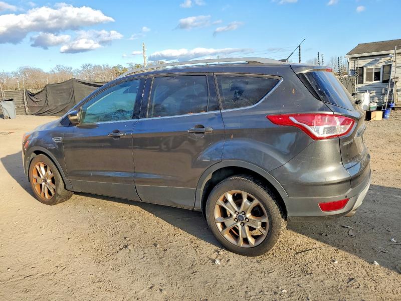 Photo 2 from auction – 2015 FORD ESCAPE TIT with VIN 1FMCU9JX2FUA02041