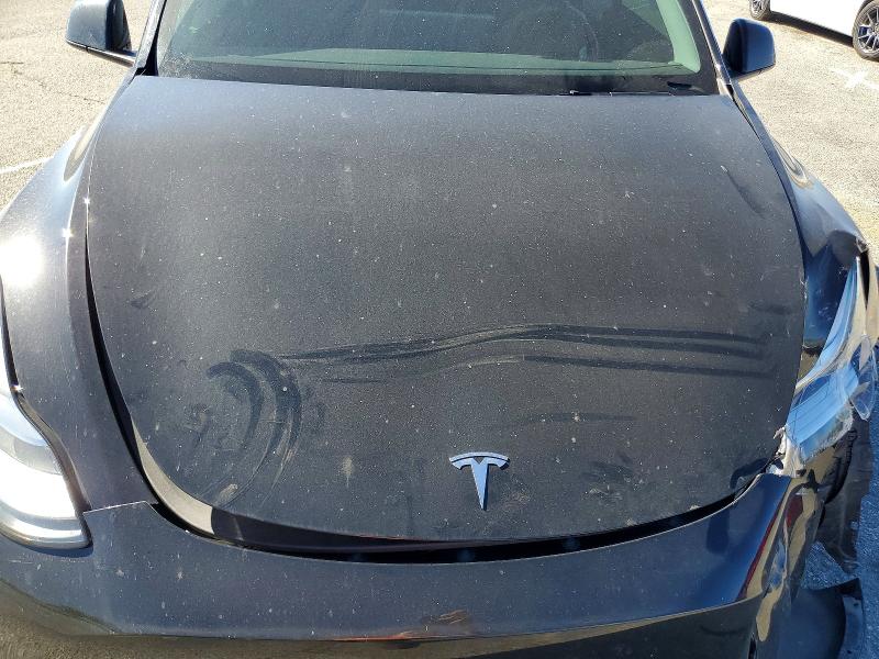 Photo 11 from auction – 2023 TESLA MODEL Y with VIN 7SAYGDEE8PA025170