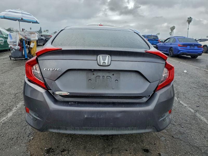 Photo 6 from auction – 2018 HONDA CIVIC LX with VIN 2HGFC2F55JH512965