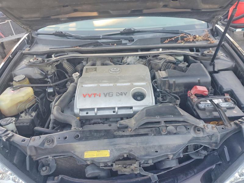 Photo 11 from auction – 2004 TOYOTA CAMRY LE with VIN JTDBF32K240152956