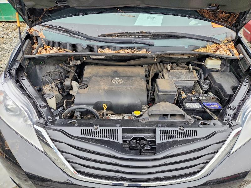 Photo 12 from auction – 2014 TOYOTA SIENNA LE with VIN 5TDKK3DCXES495997