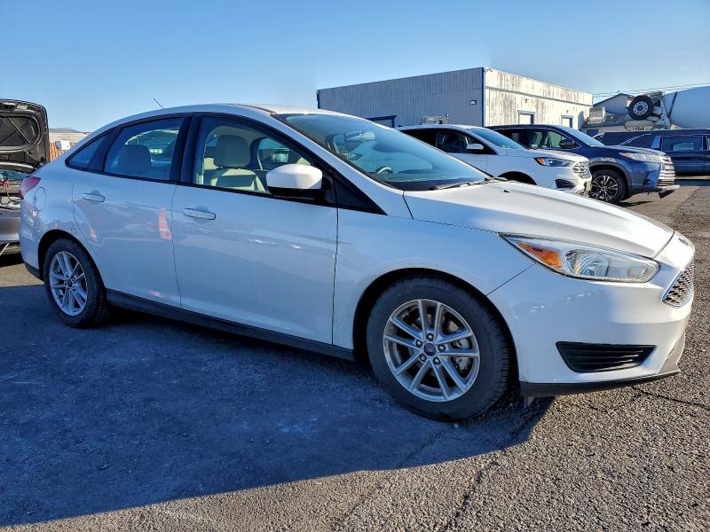 Photo 4 from auction – 2018 FORD FOCUS SE with VIN 1FADP3F23JL230659