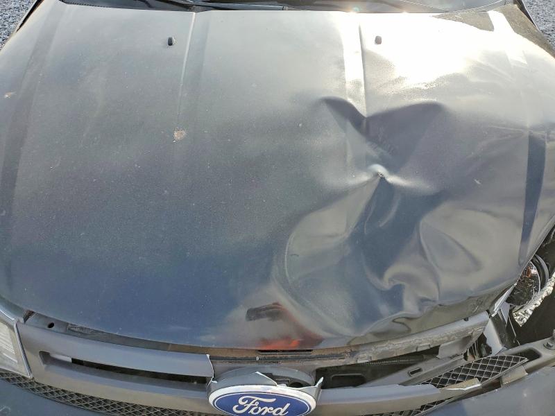 Photo 11 from auction – 2011 FORD FOCUS SES with VIN 1FAHP3GN2BW133088