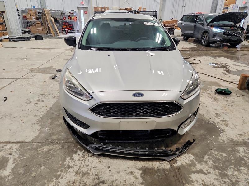 Photo 5 from auction – 2016 FORD FOCUS with VIN 1FADP3E22GL377100