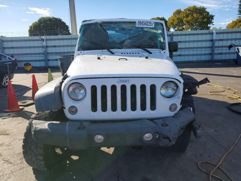 Photo 5 from auction – 2014 JEEP WRANGLER U with VIN 1C4BJWDG7EL156610
