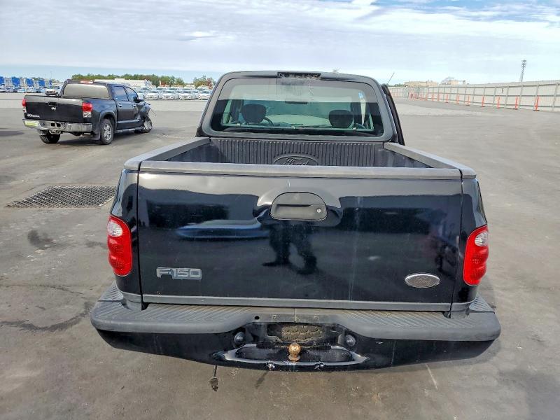 Foto 6 de la subasta – 2003 FORD F150 con VIN 1FTRX07WX3KD27561