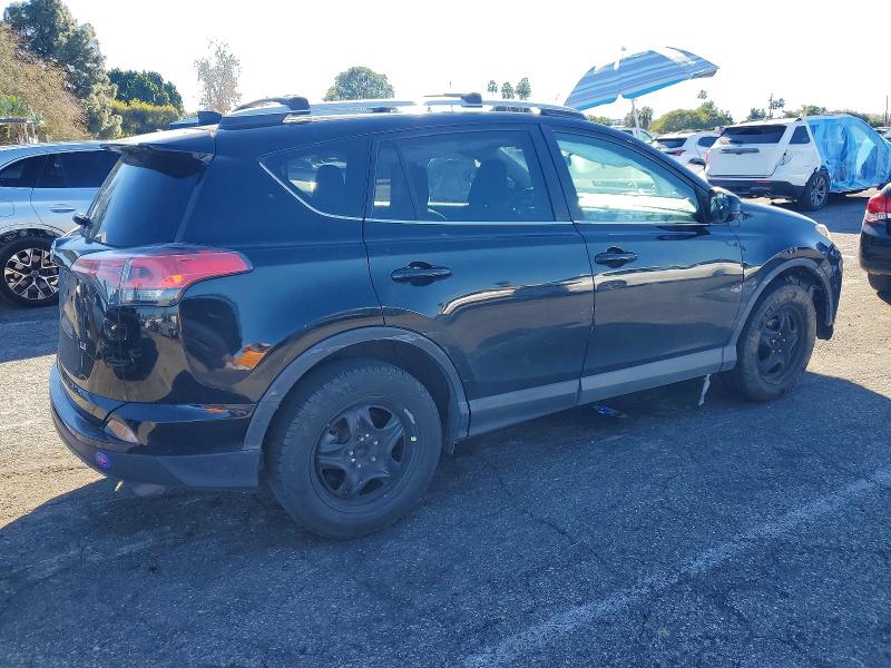 Photo 3 from auction – 2016 TOYOTA RAV4 LE with VIN 2T3ZFREV8GW247013