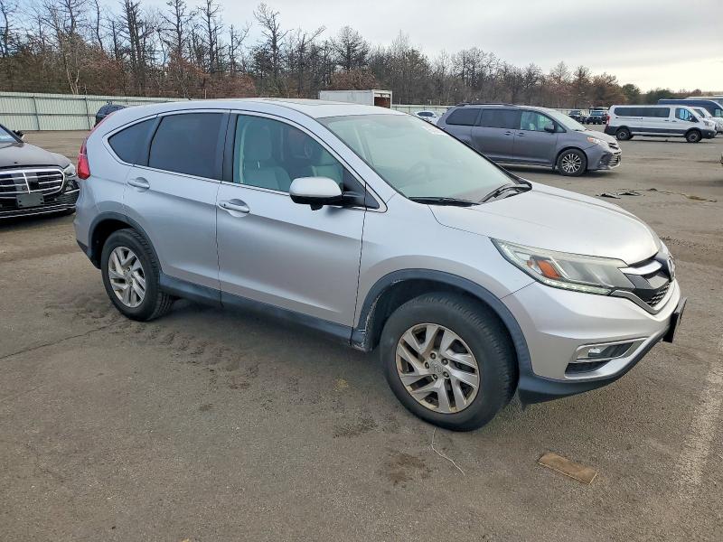 Photo 4 from auction – 2015 HONDA CR-V with VIN 2HKRM4H54FH668012