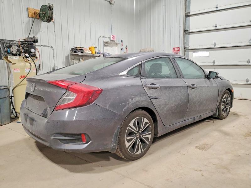 Photo 3 from auction – 2016 HONDA CIVIC EX with VIN 19XFC1F8XGE000769