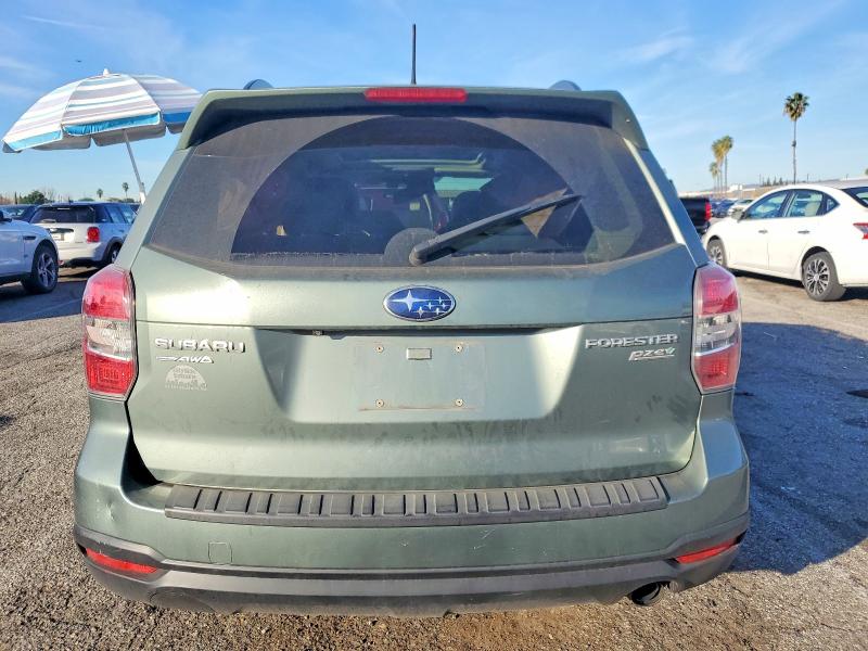 Photo 6 from auction – 2014 SUBARU FORESTER with VIN JF2SJAMC4EH518977