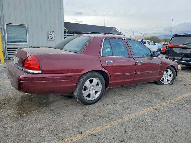 Photo 3 from auction – 2011 FORD CROWN VICT with VIN 2FABP7EVXBX139340