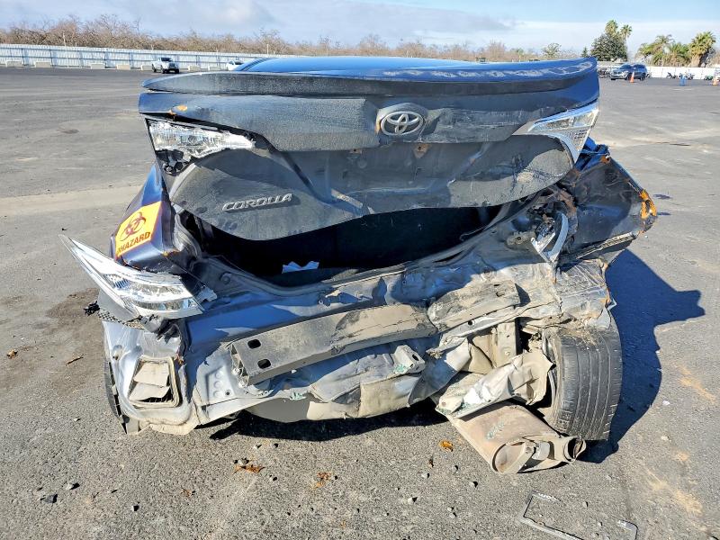 Photo 6 from auction – 2014 TOYOTA COROLLA L with VIN 5YFBURHE9EP042097
