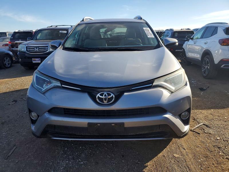 Photo 5 from auction – 2016 TOYOTA RAV4 XLE with VIN 2T3RFREV4GW411633