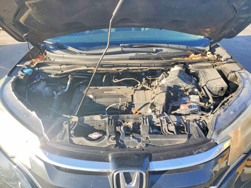 Photo 12 from auction – 2016 HONDA CR-V LX with VIN 2HKRM4H31GH701645