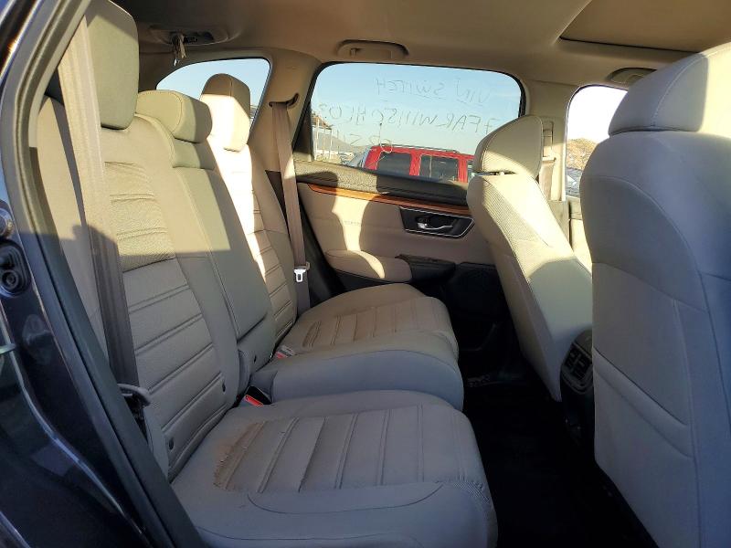 Photo 11 from auction – 2017 HONDA CR-V with VIN 7FARW1H50HE030353