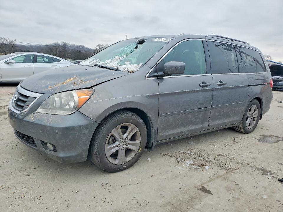 Photo 1 from auction – 2010 HONDA ODYSSEY TO with VIN 5FNRL3H96AB069183