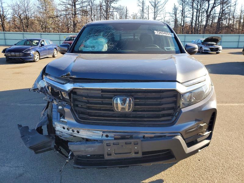 Photo 5 from auction – 2023 HONDA RIDGELINE with VIN 5FPYK3F70PB016463